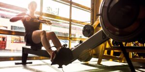 How Does Using a Rowing Machine Enhance Cardio and Strength?